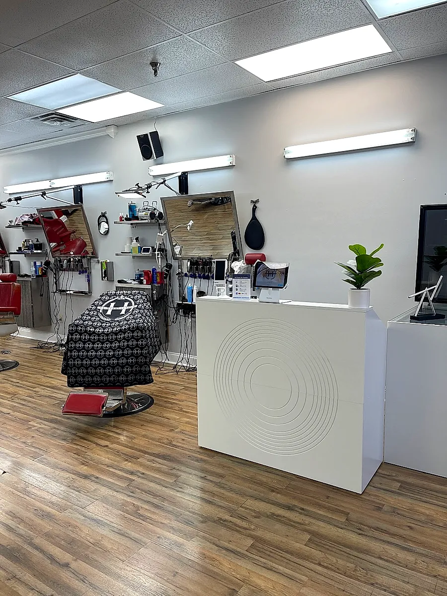 Bright interior of the Hairtrapreneur barber spa